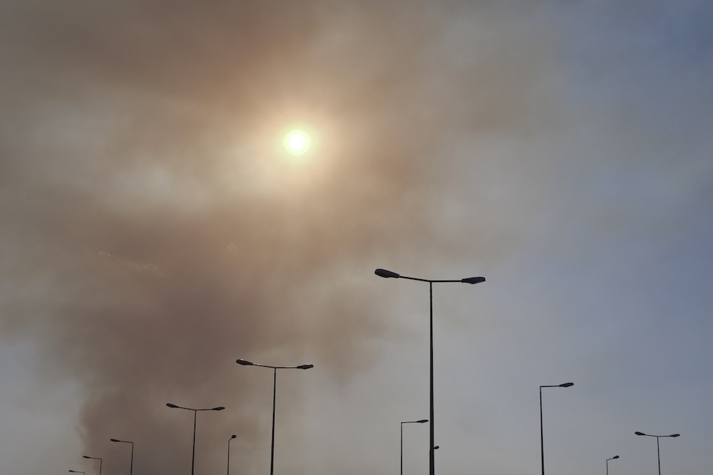 A black plume of smoke and haze remain in the sky near the Shepherd chemical plant explosion in Texas.